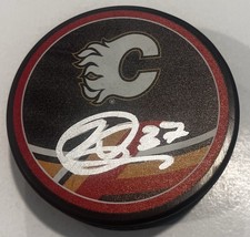 YAN KUZNETSOV SIGNED CALGARY FLAMES HOCKEY PUCK W/ CASE COA