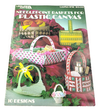 NEEDLEPOINT BASKETS 10 PLASTIC CANVAS PATTERNS 1982 LEISURE ARTS 10 DESIGNS