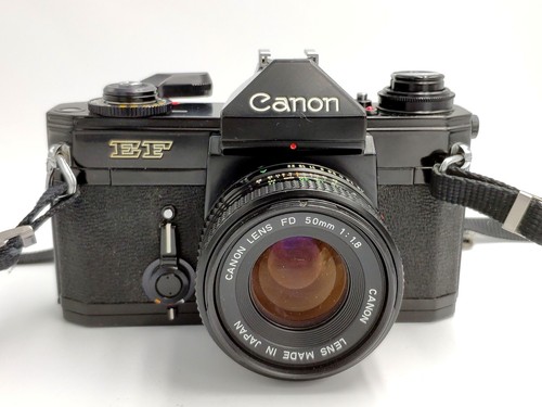 Canon EF Camera with Canon 50mm f1.8 FD Lens.