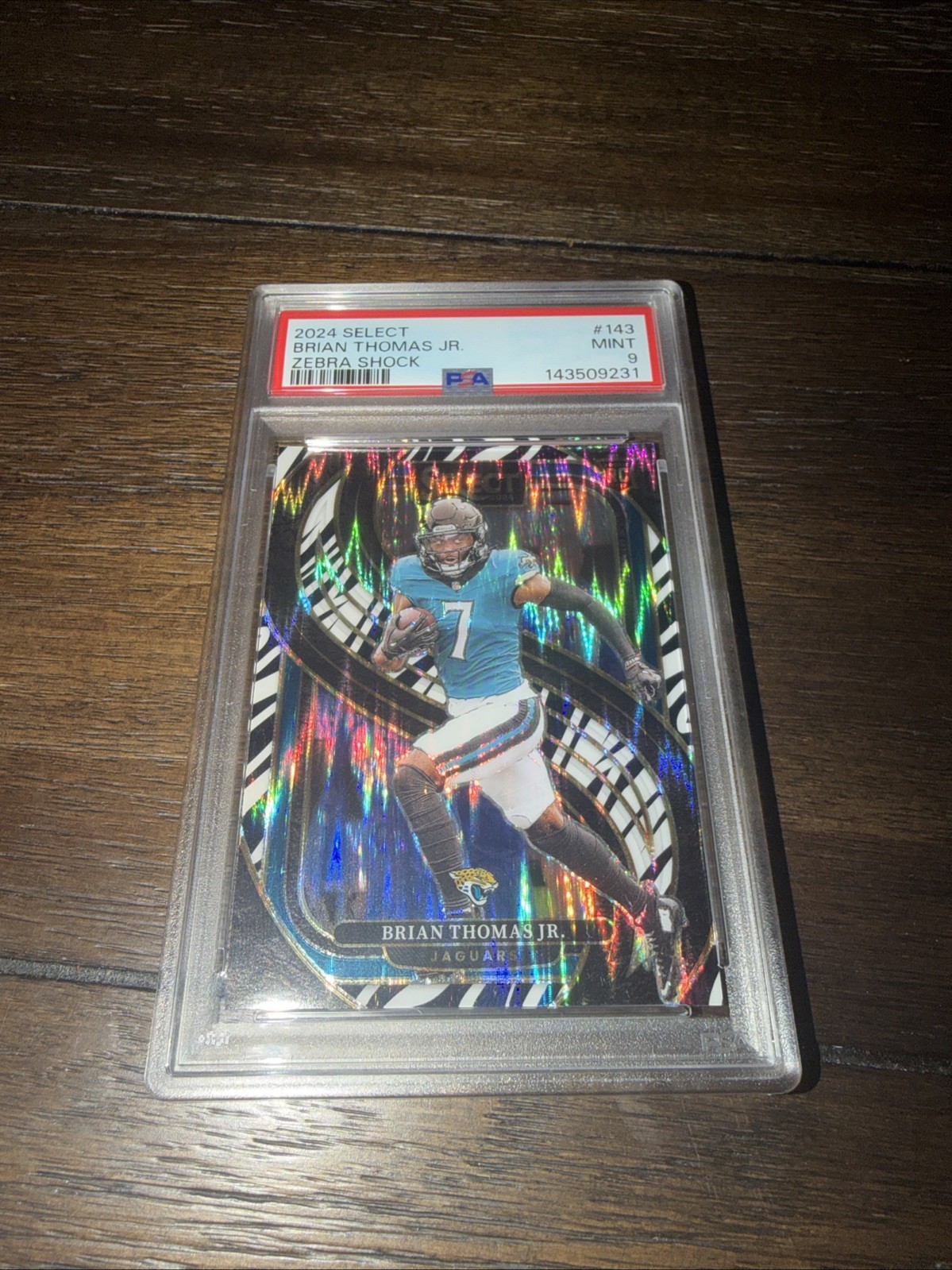 2024 Panini Select Brian Thomas Jr. #143 Zebra Shock (RC) Case Hit Jaguars PSA 9