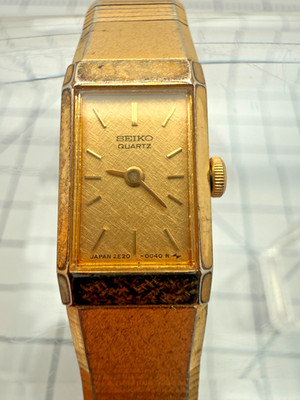 Seiko 2E20-5029 13mm Quartz Gold-Tone Tank Textured Dial Petite Watch