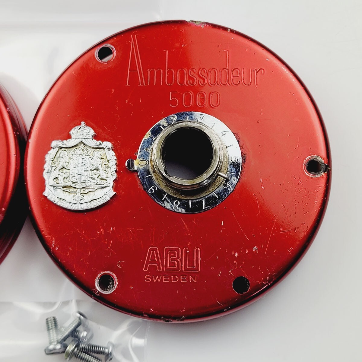 Abu Garcia Ambassadeur 5000 Reel Parts - red side plate set with screws