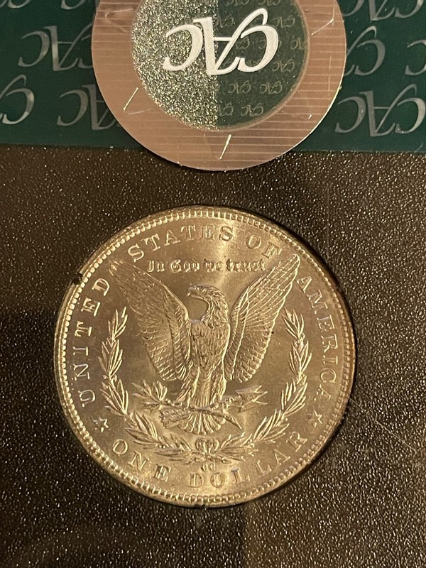 1884 CC Morgan Silver Dollar GSA NGC MS-65