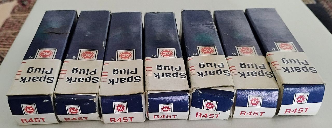 Lot of 7 Vintage AC Delco R45T Spark plugs NOS/Open Box Bought in Mid 1990s READ