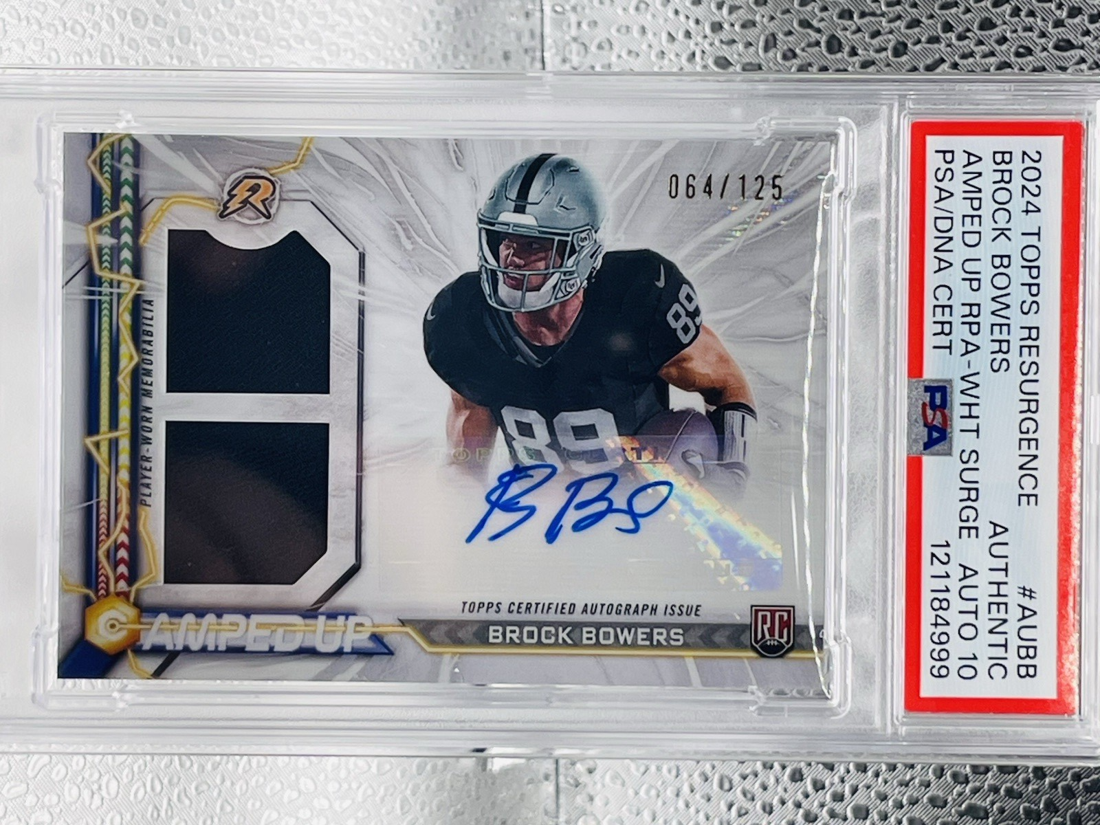Brock Bowers Las Vegas Raiders - 2024 Resurgence 64/125 - Amped Up Dual Patch Auto - PSA AUTO 10 