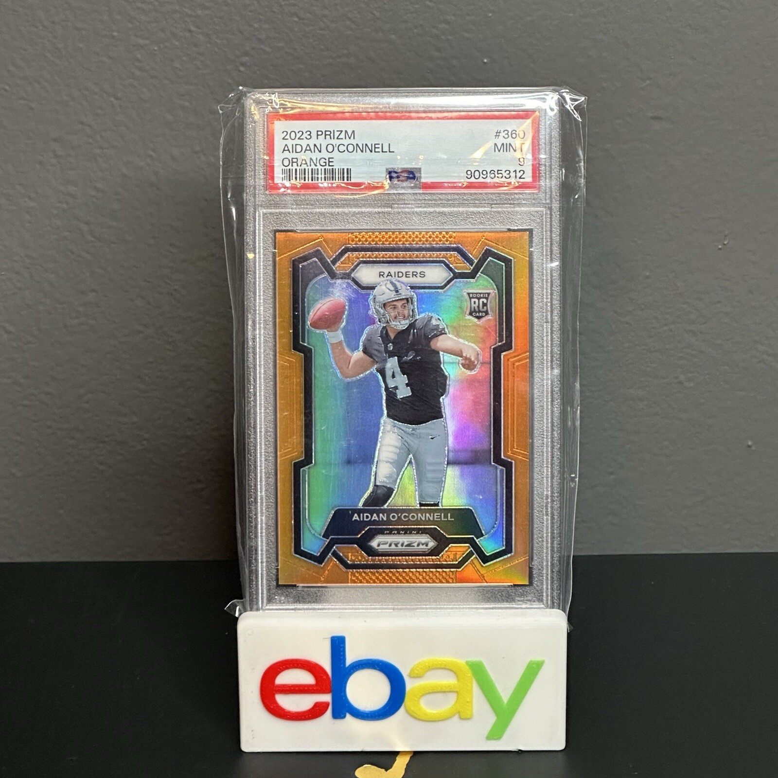 2023 Panini Prizm Aidan O’Connell PSA 9 Orange Prizm Rookie /249 Raiders #360