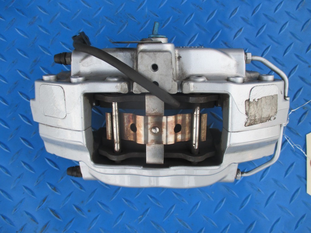 Maserati Ghibli left rear brake caliper #5473