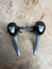 SHIMANO ST-2303 3x8 SPEED TRIPLE ROAD BIKE GEAR SHIFTERS IN GOOD CONDITION.