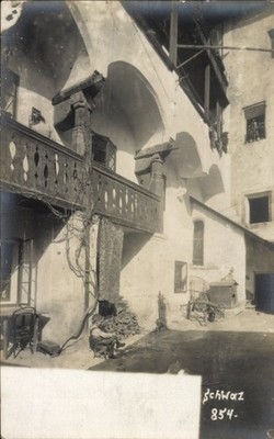 Postcard Schwaz in Tyrol, black, building with balcony, columns, chair,... - 4994126