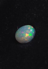 Cabochon (n°40) ovale d’Opale Welo blanche d’Ethiopie 0,77 cts