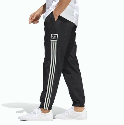 adidas originals large trefoil track pants in black