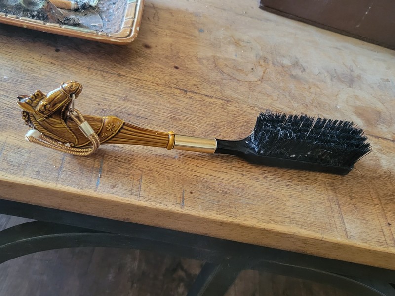  Vintage brush likely features a celluloid or faux wood handle