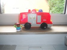 Samochód strażacki Fisher Price z figurką, używany