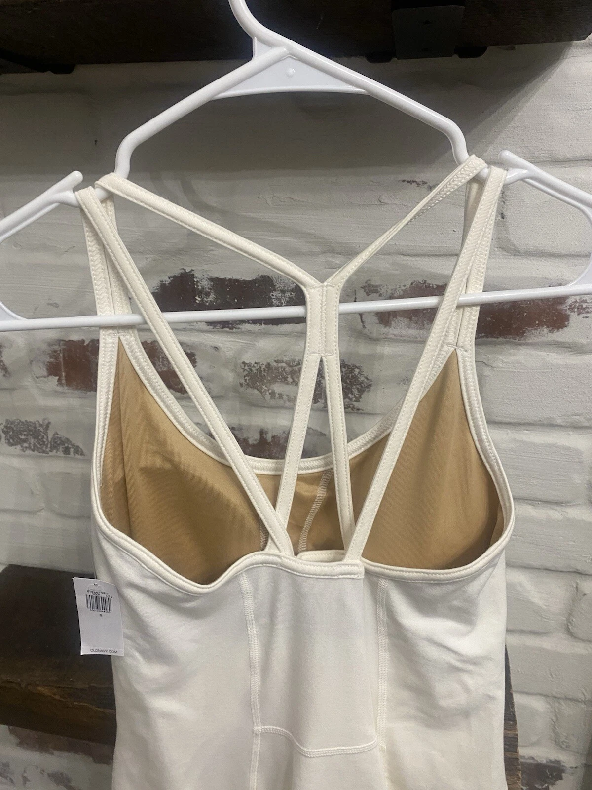 OFF WHITE Reggiseno vestito Oldy Navyvo att topto cortosto nasco tascae colore bianco sporc nuo conchetta eti sm.ghia