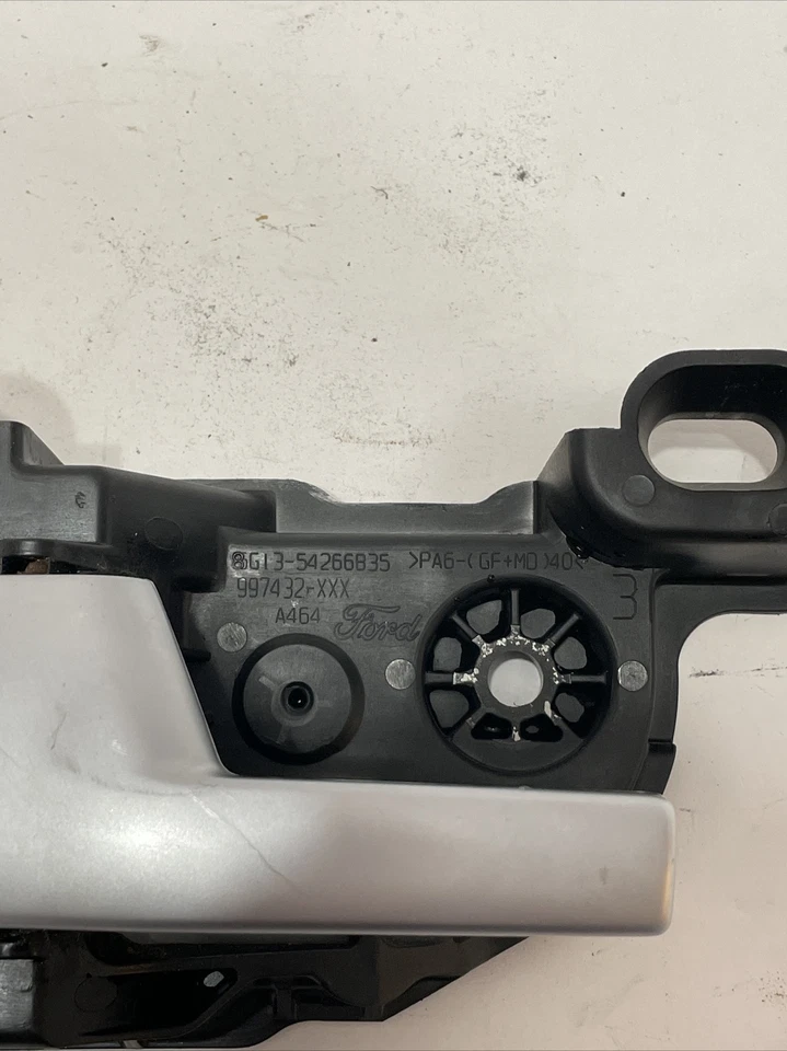 Mercury Sable 2008-2009 lado del conductor izquierdo puerta trasera abridor de manija interior fabricante de equipos originales Foto 2 de 4