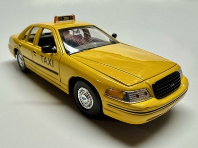 Yellow 1/24 1999 Ford Crown Victoria Taxi Die-cast Car By Welly