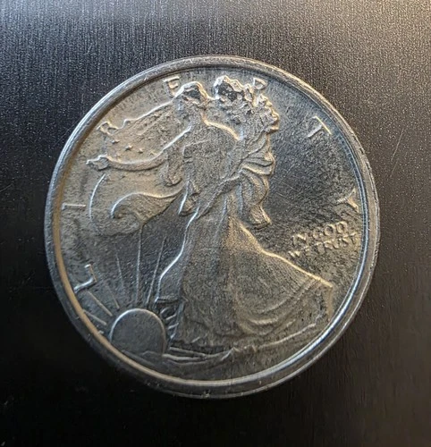 .999 Fine .25 oz Walking Liberty Design Silver Round