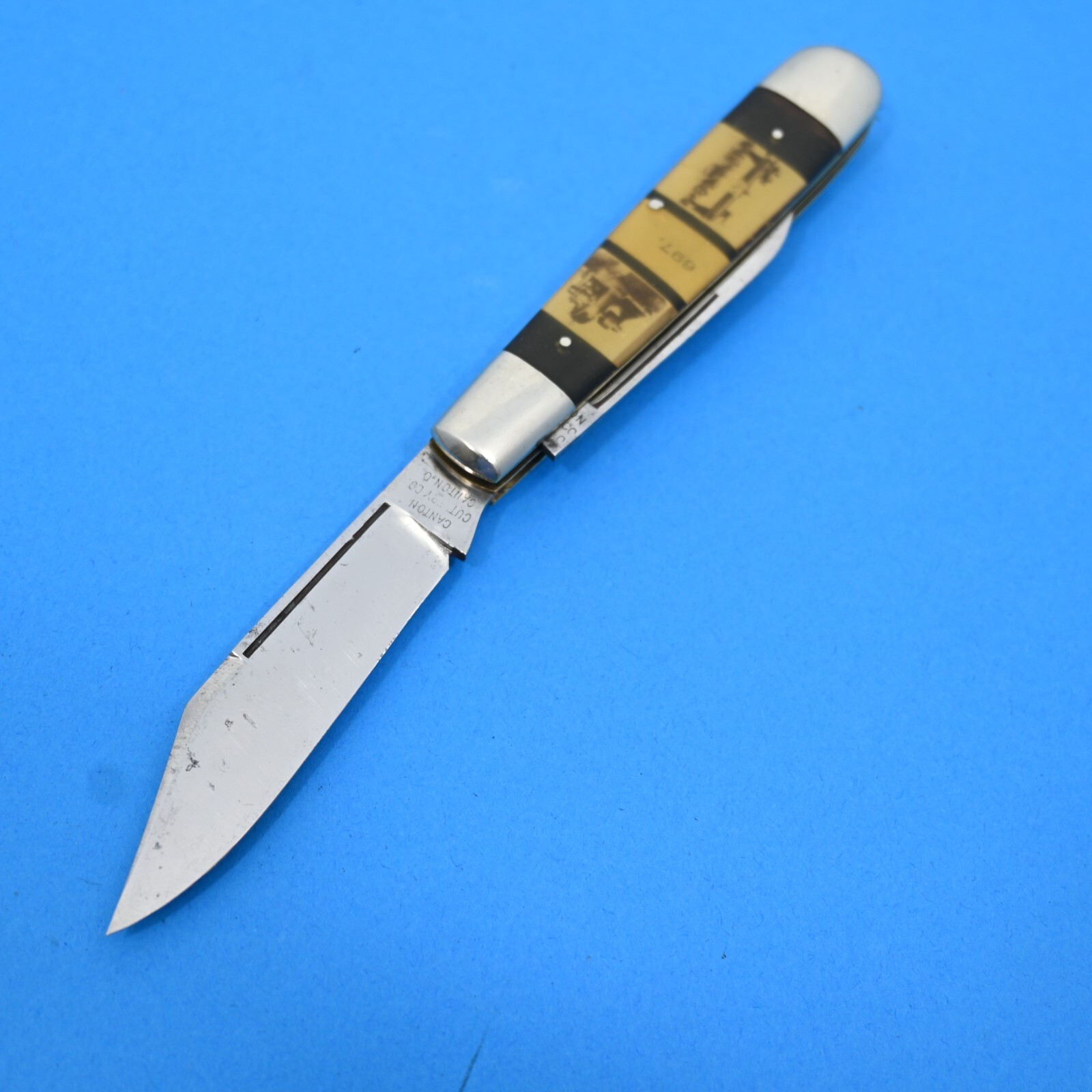 CANTON CUTLERY CO., CANTON, O. LARGE SLEEVEBOARD CELLULOID MINTY JACK