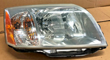 2004 Mitsubishi Endeavor Headlight Passenger Right 2004-2008 2004 Mitsubishi Endeavor Headlight Passenger Right 2004-2008