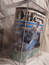 NFL Houston oilers 1991 yearbook/football signed by Warren moon,other players