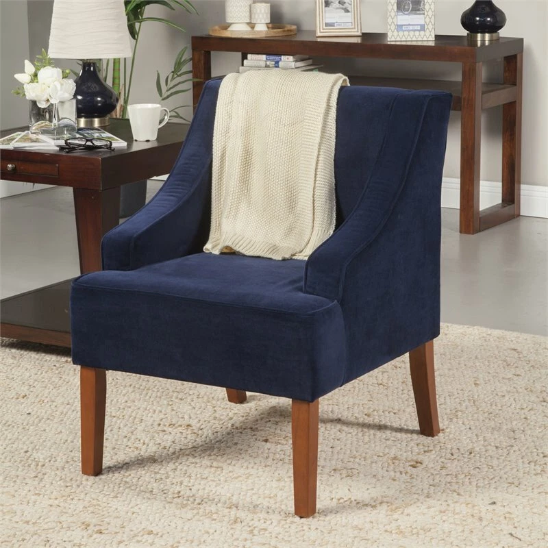 Silla HomePop tradicional de madera y terciopelo con brazo abatible en azul oscuro Foto 3 de 4