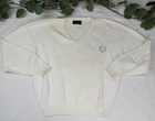 White VTG Christian Dior men’s V-neck sweater with blue monogram logo on chest and short sleeves, made in USA.