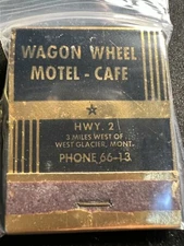 VINTAGE MATCHBOOK - WAGON WHEEL MOTEL - CAFE - WEST GLACIER, MO - FRONT STRIKE