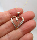 10K Yellow Gold 32 Diamond Baguette Heart Pendant Necklace 20" — photo 4