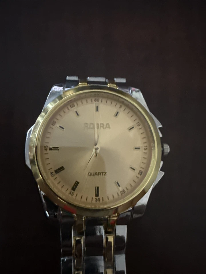 Reloj de cuarzo Rosra pulsera de acero inoxidable tono oro plateado Foto 2 de 2