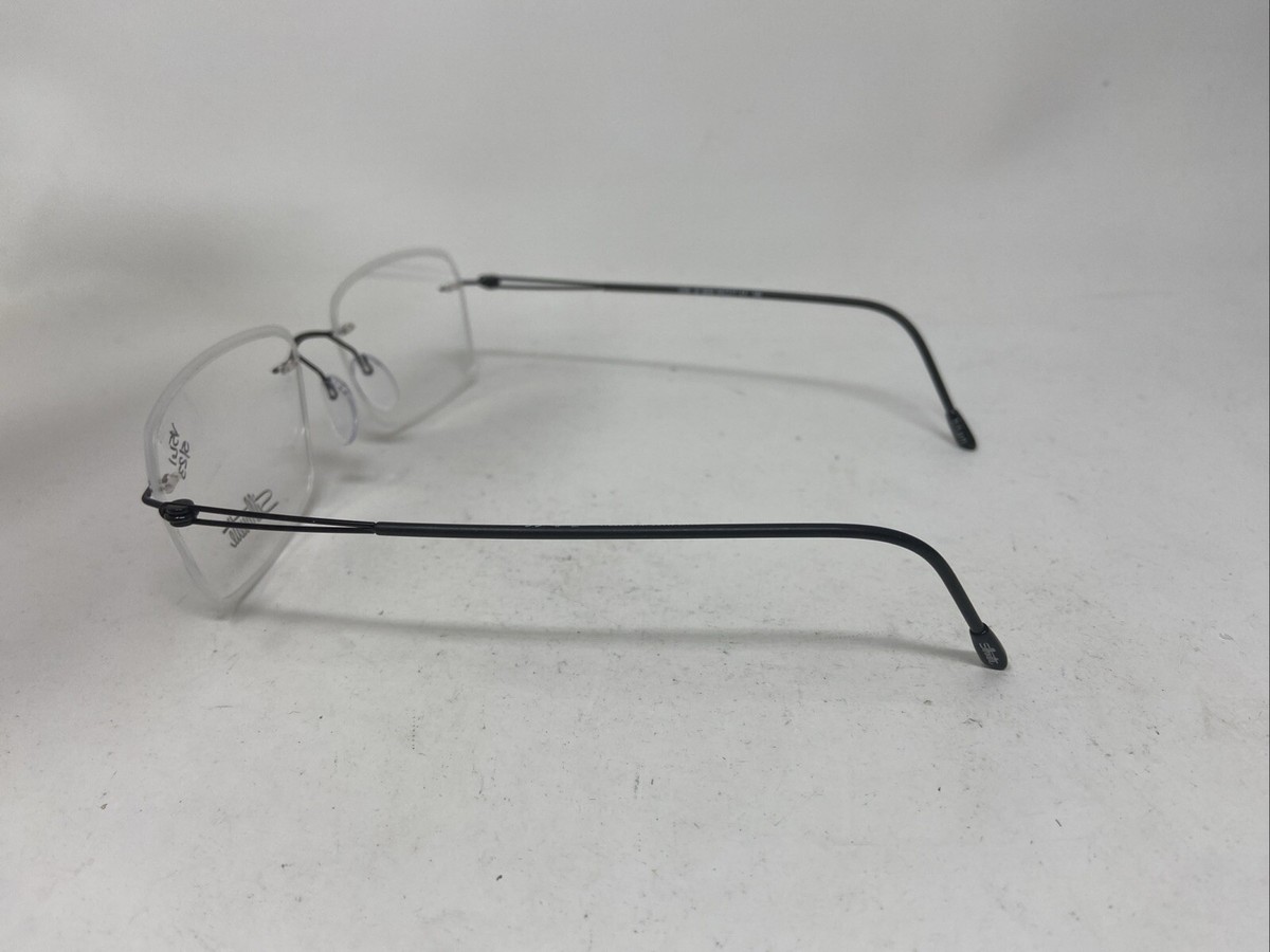SILHOUETTE EYEWEAR 5566 JH 9040 53-17-140 BLACK RIMLESS EYEGLASSES
