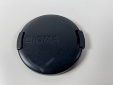 Sigma old style 52mm edge pinch front lens cap.