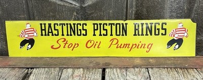Vintage Hastings Piston Rings Dealer Advertising Sign Tough Guy Graphics 19x4