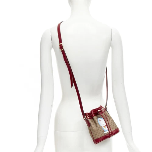 GUCCI DORAEMON 2021 Limited GG Supreme red drawstring crossbody bucket bag