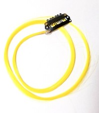 Bright yellow hair extension clip in, thin strand