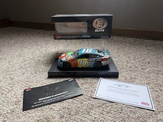 Kyle Busch Autographed #18 M&M's Hazelnut Spread NASCAR 1:24 Die Cast Car