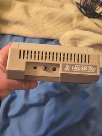 Classic NES game console. 2 controllers and NES advantage in box with packaging