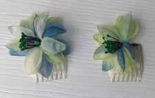 vintage hair plastic clear combs with blue cream green nylon flowers