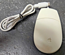 Apple Desktop Bus Mouse II, model family M2706, ADB connector.