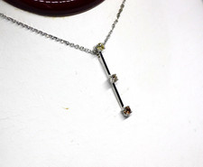 VINTAGE THREE DIAMOND ON A 14K WHITE GOLD BAR NECKLACE