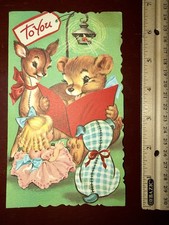 Tarjeta de felicitación navideña vintage oso de peluche lectura a animales de peluche ciervo muñeca