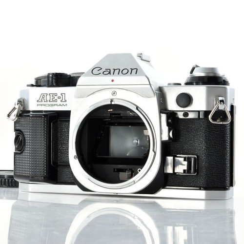 Canon T70 multiple program AE 35 mm camera with a 50 mm Canon lens