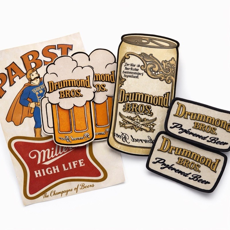 Pabst, Miller High Life And Drummond Iron Ons + 2 Drummond Patches.