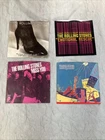 4 - Rolling Stones record Lot of 45's with Sleeves