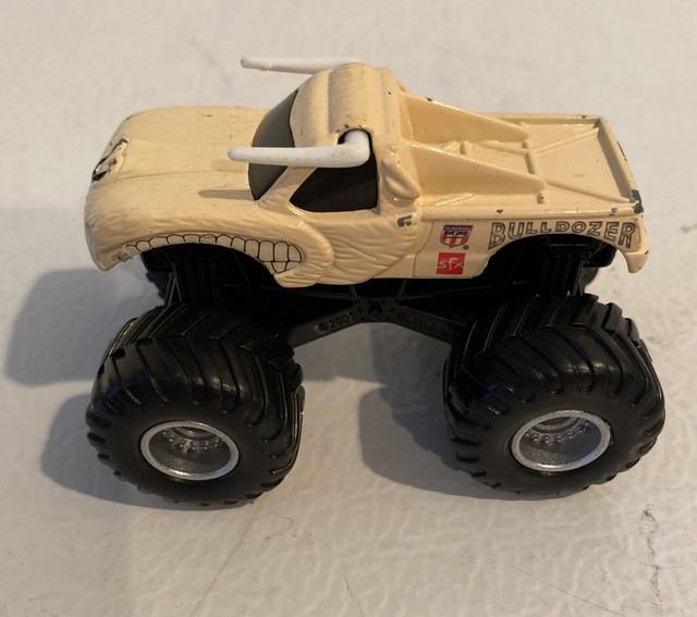 4 Diecast Plastic Monster Trucks Bulldozer, El Toro Loco, RockNRoll