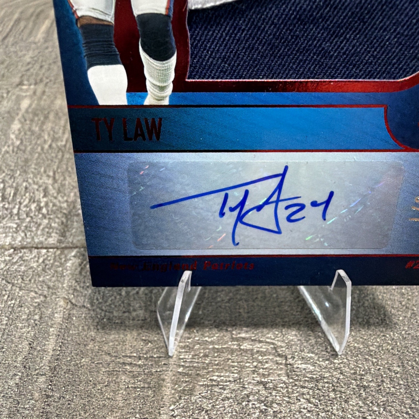 2025 Panini Silhouette Jumbo Nike Swoosh Patch Auto 5/7 - Ty Law - Patriots view 3
