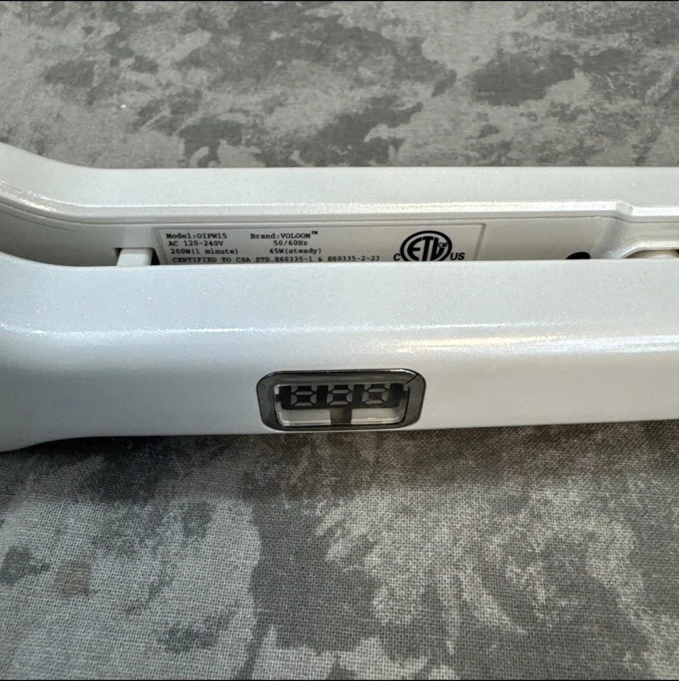 Plancha voluminizadora de cabello Voloom 1 1/2" blanca perla OIPW15 ¡Probada funcionando perfectamente! Foto 2 de 4