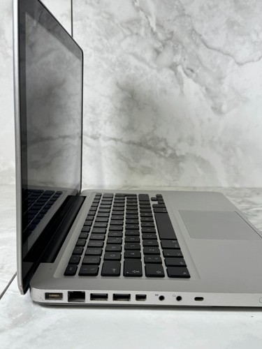 MacBook 13" Ricond. | SSD/HDD | 4GB/8GB | Batteria e Alimnetatore opzionali - Afbeelding 2 van 5