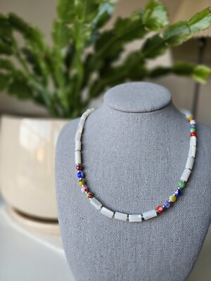 handmade necklace from natural shell beads with flowers glass beads