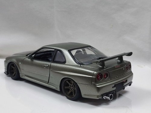 Motormax 1/18 Nissan Skyline R34 GTR Millennium Jade modificado a medida - Imagen 12 de 12