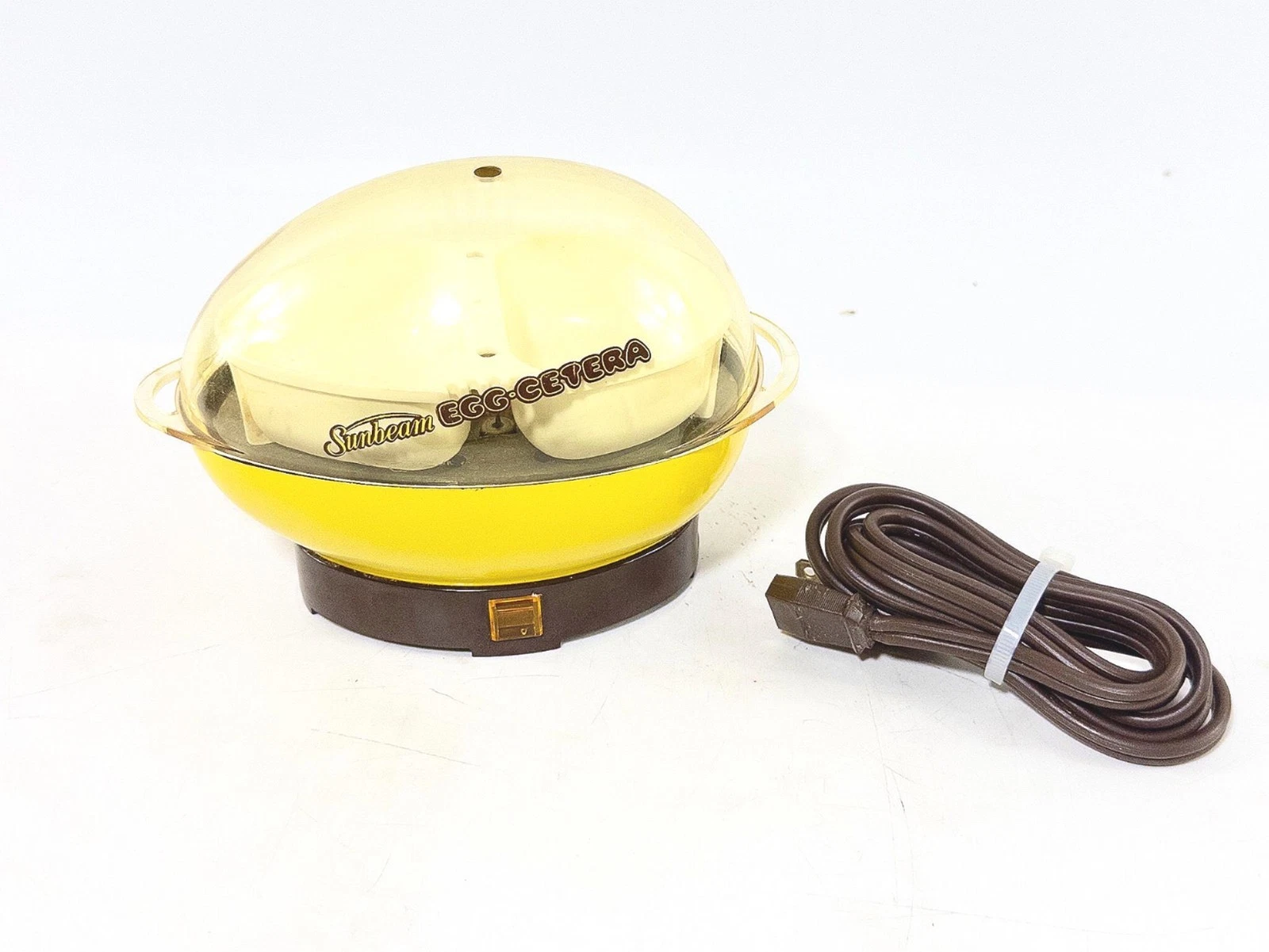 Vintage Sunbeam EGG-CETERA Mini Egg Cooker GOLDEN EGG Model 23-23, Tested, Works
Opens in a new wind